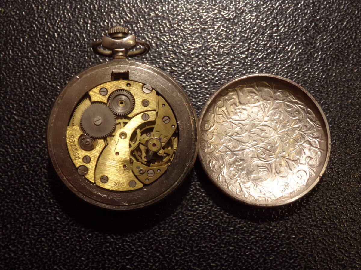 Карманные часы с Амуром. Начало 20 века.